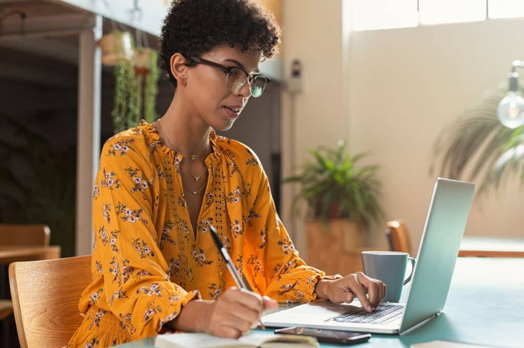 Female professional working on laptop