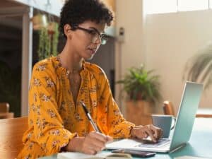 Female professional working on laptop