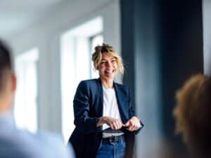 Female professional presenting in a meeting